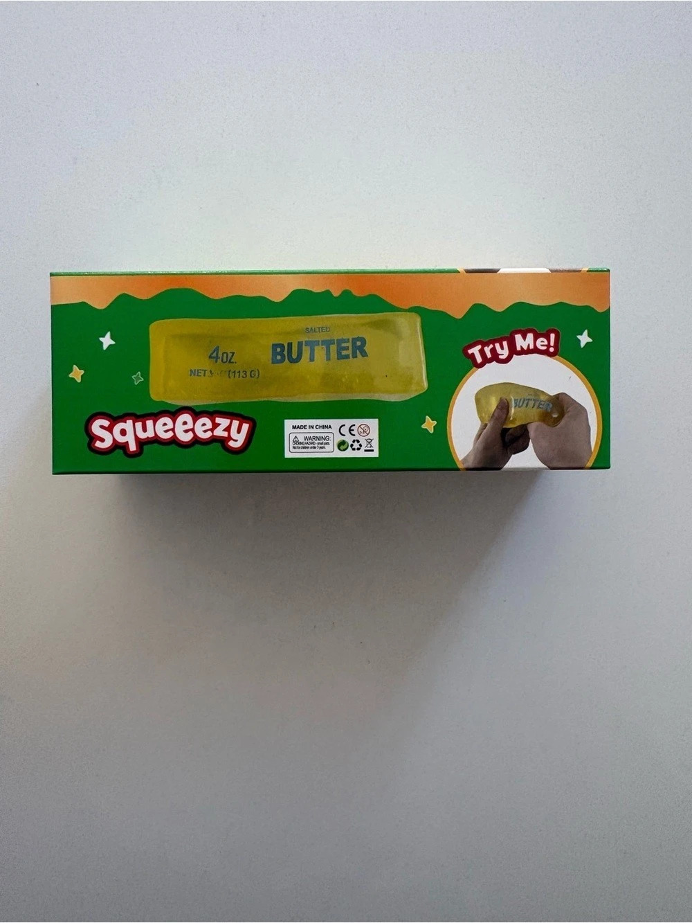 Sunny Days Entertainment Squeezy Butter Toy Green & Yellow